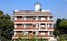 the palatial homes building in day time best homestay in dehradun