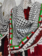 original Palestinian keffiyeh, adorned with the vibrant colors of the Palestinian flag