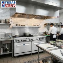commercial kitchen with cooking equipment