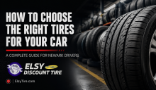 Wide cinematic blog banner for Elsy Discount Tire featuring a close-up of premium car tires inside a professional tire shop with a dark automotive theme. Bold white headline reads “How to Choose the Right Tires for Your Car” with the subheading “A Complete Guide for Newark Drivers.” The Elsy Discount Tire logo and ElsyTire.com branding appear in the bottom left corner with red accent design elements.