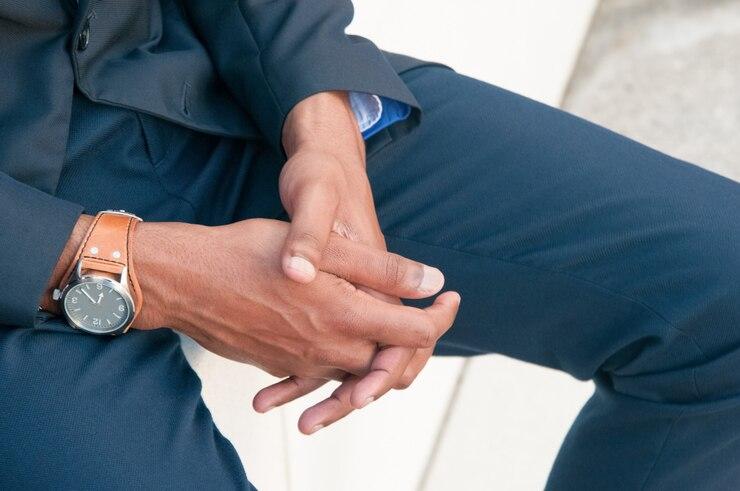 closeup businessman clasped hands