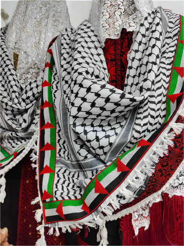 original Palestinian keffiyeh, adorned with the vibrant colors of the Palestinian flag