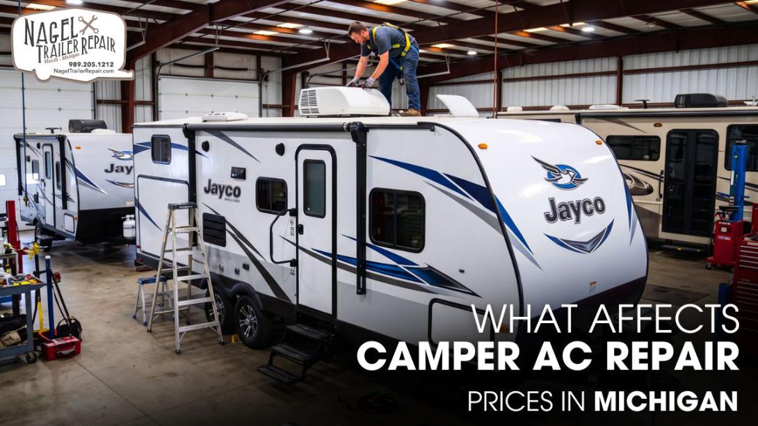 A Male Technician Repairing the AC Unit of a Jayco Camper inside a Workshop
